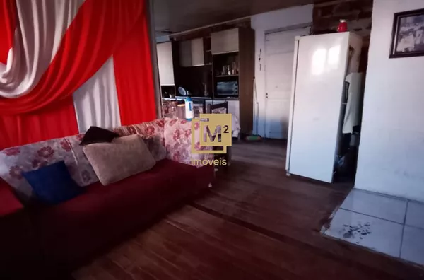 Terreno Escriturado no Bairro Santa Fé com 374m² e 3 Casas