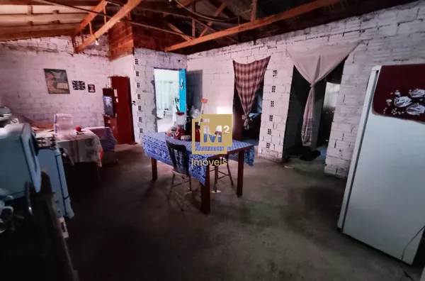 Terreno Escriturado no Bairro Santa Fé com 374m² e 3 Casas