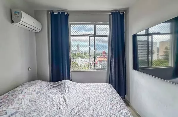 Apartamento de dois quartos com vaga de garagem