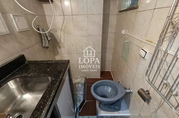 Apartamento de sala quarto cozinha banheiro de frente centro do Rio de Janeiro