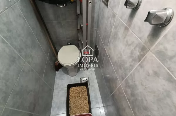 Apartamento sala um quarto dependência revertida garagem Centro Rio de Janeiro
