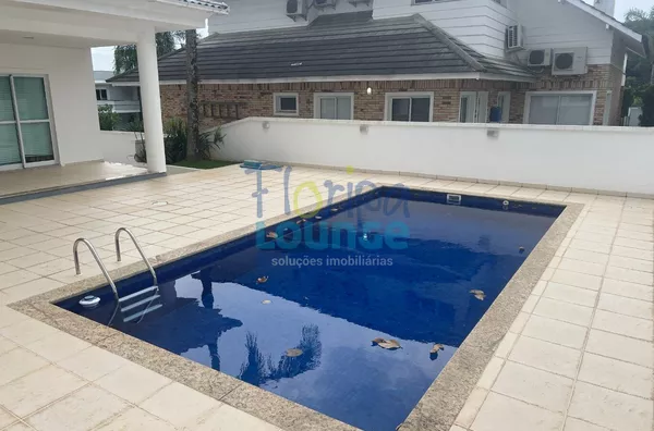 MANSÃO EM CONDOMÍNIO NO CACUPÉ