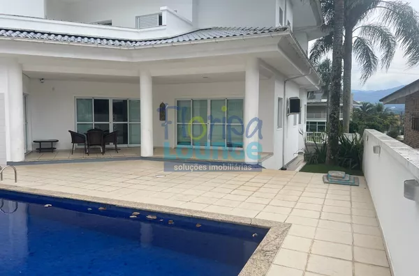 MANSÃO EM CONDOMÍNIO NO CACUPÉ