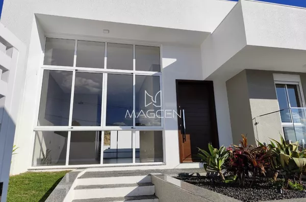 Casa com três suítes no bairro Industrial 