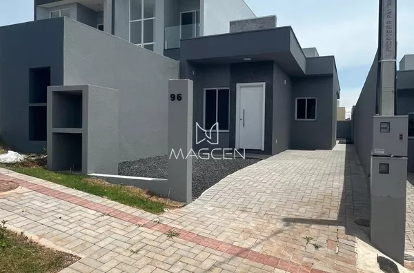 Casa com sobra de lote para ampliação 