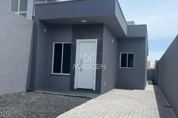 Casa com sobra de lote para ampliação 