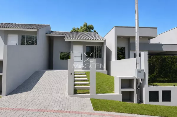 Casas de mesma planta com fácil acesso a UTFPR e com bastante sobra de lote 