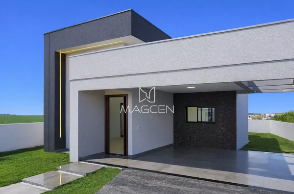 Casa em lote inteiro e 2 garagens 