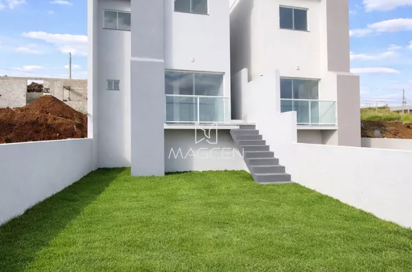 CASA COM SALÃO DE FESTAS 