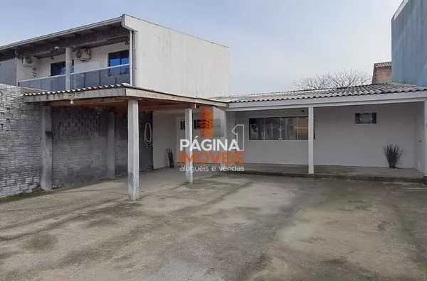 Página 1 Imóveis anuncia para venda e locação, ampla casa com 02 dormitórios no bairro Harmonia em Canoas–RS.