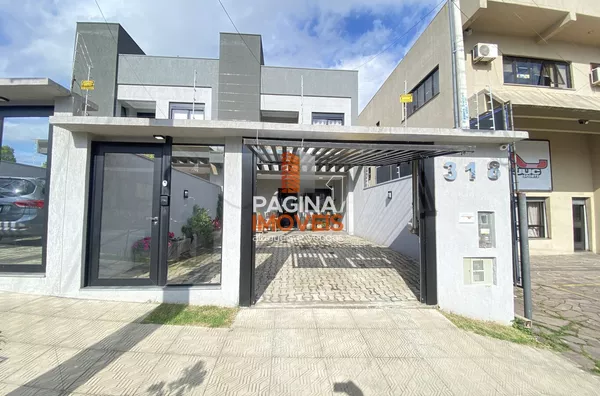 Página 1 Imóveis anuncia ótima oportunidade de Sobrado  para Venda,  com  3 Suítes e 2 vagas coberta rio, no bairro Igara em  Canoas/RS.