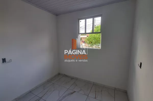 Pagina 1 Imóveis anuncia para aluguel, "casa com 2 dormitórios" no bairro Harmonia em Canoas/RS.