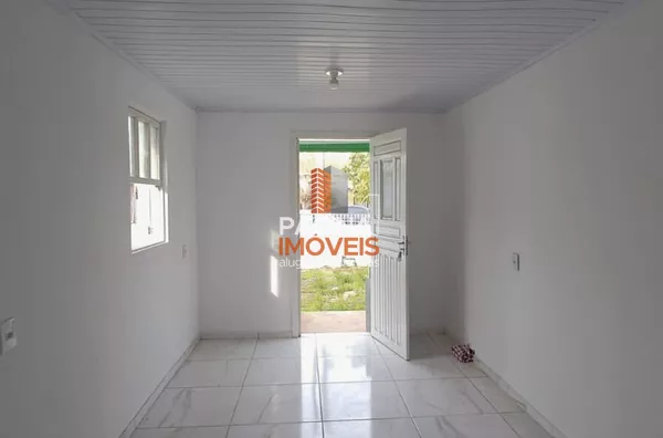 Pagina 1 Imóveis anuncia para aluguel, "casa com 2 dormitórios" no bairro Harmonia em Canoas/RS.