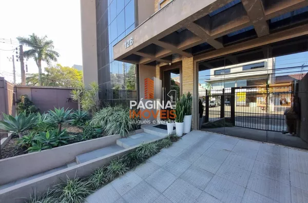 Página 1 Imóveis anuncia belíssima sala comercial com recepção/sala de espera e 01 vaga de garagem no bairro Marechal Rondom, Canoas/RS. - Foto 1