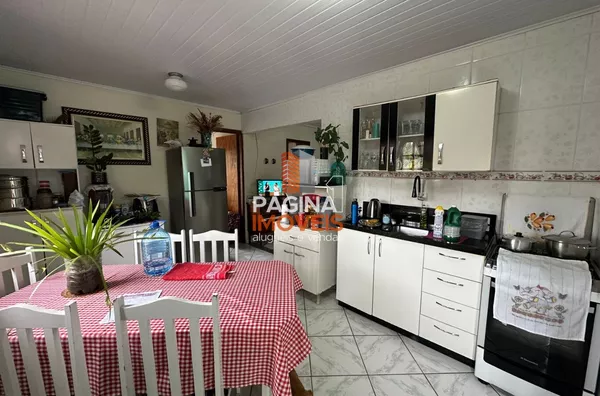 Página 1 Imóveis anuncia para venda, Terreno com 3 casas no bairro Olaria em Canoas–RS.