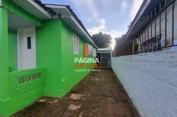 Pagina 1 Imóveis anuncia para aluguel, "casa com 2 dormitórios" no bairro Harmonia em Canoas/RS.