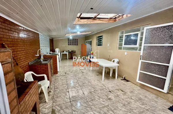ÁREA DE LAZER COM CHURRASQUEIRA