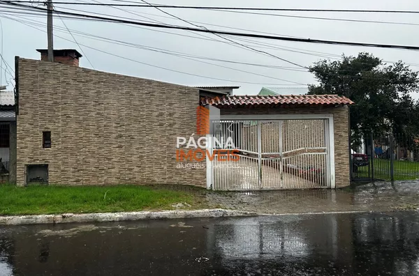 Página 1 Imóveis anuncia venda de casa com piscina e 4 dormitórios, sendo 1 suíte, no Bairro Harmonia em Canoas/RS. - Foto 1