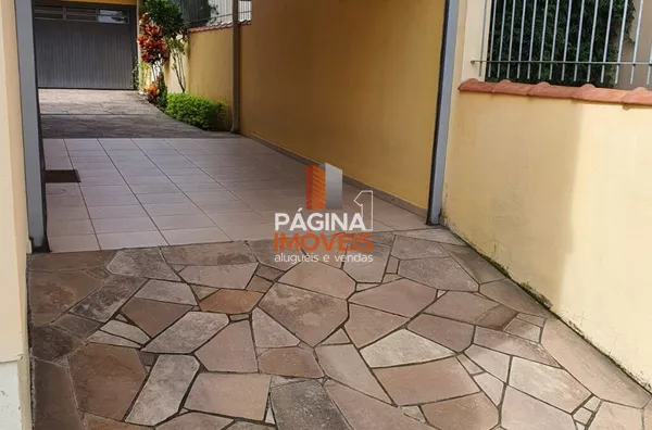 Entrada lateral/Acesso ao prédio da garagem