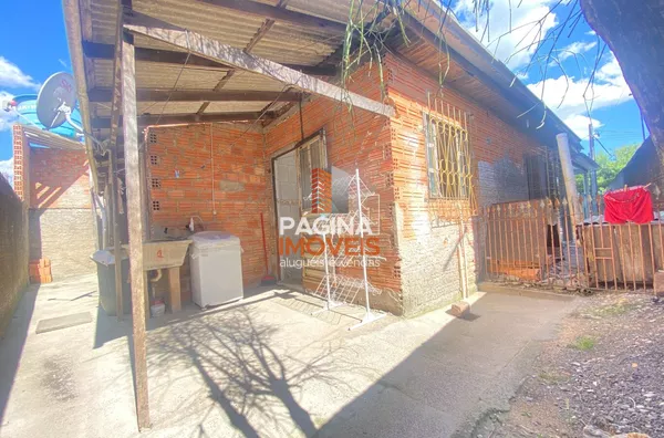 Pátio dos fundos com área de serviço