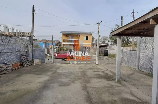 Página 1 Imóveis anuncia para venda e locação, ampla casa com 02 dormitórios no bairro Harmonia em Canoas–RS.