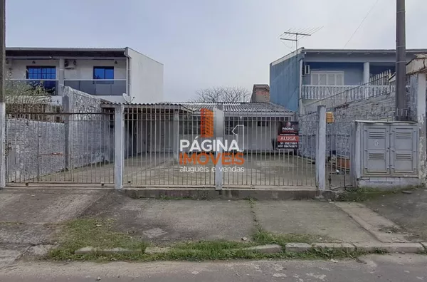 Página 1 Imóveis anuncia para venda e locação, ampla casa com 02 dormitórios no bairro Harmonia em Canoas–RS.