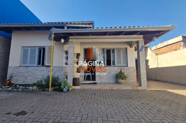 Página 1 Imóveis anuncia para venda, uma linda casa com 03 dormitórios, no bairro Harmonia em Canoas/RS.