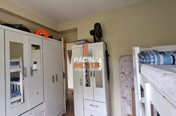 Página 1 Imóveis anuncia para venda um encantador apartamento 02 dormitórios, no condomínio Jardim Baviera, no bairro Igara em Canoas.