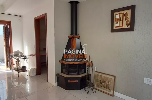 Pagina 1 Imóveis anuncia para aluguel, excelente casa de esquina com 3 dormitórios e 1 suíte no bairro Fátima em Canoas/RS - Foto 2