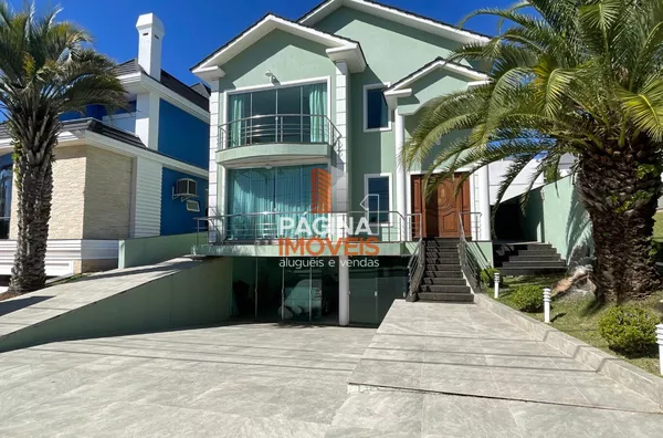 Página 1 Imóveis anuncia para aluguel casa no "Condomínio Alphaville" em Gravataí/RS - Foto 1