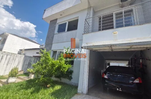 Página 1 Imóveis anuncia para venda, Casa com 04 dormitórios, sendo 02 suítes, no Bairro Igara em Canoas/RS.