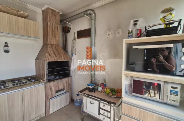 Espaço gourmet com churrasqueira