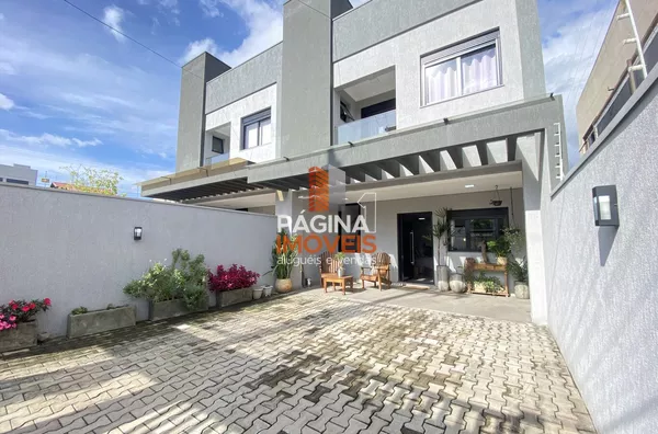 Página 1 Imóveis anuncia ótima oportunidade de Sobrado  para Venda,  com  3 Suítes e 2 vagas coberta rio, no bairro Igara em  Canoas/RS.