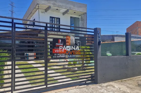 Página 1 Imóveis anuncia para venda uma excelente e encantadora casa de 02 dormitório, no bairro Harmonia em Canoas/RS.
