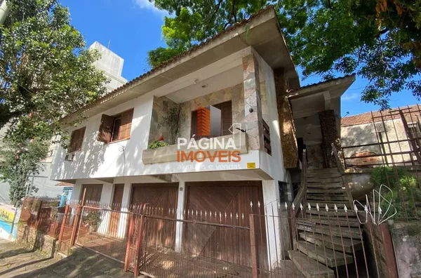 Página 1 Imóveis anuncia casa para venda, 03 dormitórios, sendo 01 suíte no bairro Marechal Rondon em Canoas/RS