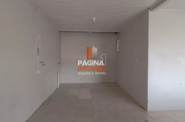 Página 1 Imóveis anuncia para venda e locação, ampla casa com 02 dormitórios no bairro Harmonia em Canoas–RS.