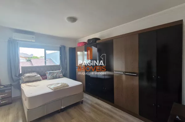 Página 1 Imóveis anuncia para venda, Casa com 04 dormitórios, sendo 02 suítes, no Bairro Igara em Canoas/RS.