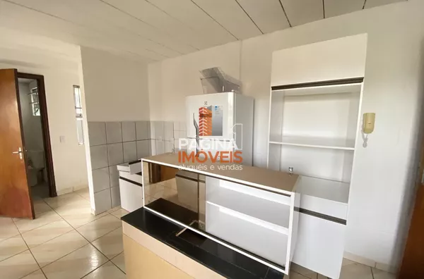 Página 1 Imóveis anuncia para aluguel, apartamento de 2 dormitórios, sendo 1 vaga de garagem no "Condomínio Porangaba B", bairro Estância Velha, Canoas–RS.