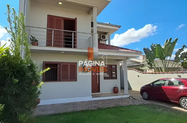 Página 1 Imóveis anuncia casa com 3 dormitórios no bairro Rio Branco em Canoas–RS. - Foto 1