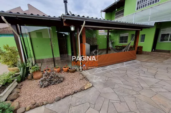 Página 1 Imóveis anuncia linda e aconchegante casa com piscina de 3 dormitórios no bairro São Luís em Canoas/RS. - Foto 4