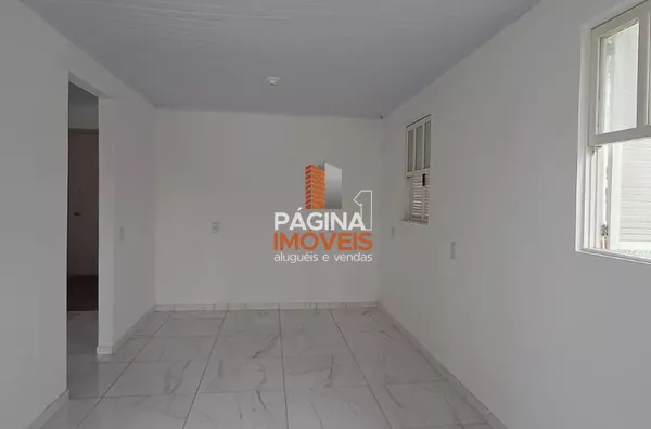 Pagina 1 Imóveis anuncia para aluguel, "casa com 2 dormitórios" no bairro Harmonia em Canoas/RS.