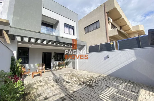 Página 1 Imóveis anuncia ótima oportunidade de Sobrado  para Venda,  com  3 Suítes e 2 vagas coberta rio, no bairro Igara em  Canoas/RS.