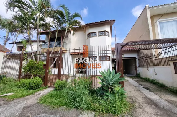 Página 1 Imóveis anuncia excelente casa sobrado com 04 dormitórios, sendo 01 suíte, no bairro Bela Vista em Canoas/RS. - Foto 1