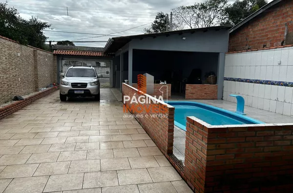 Página 1 Imóveis anuncia venda de casa com piscina e 4 dormitórios, sendo 1 suíte, no Bairro Harmonia em Canoas/RS. - Foto 3