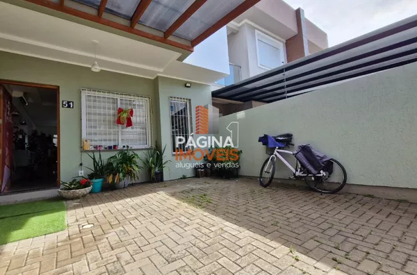Página 1 Imóveis anuncia para venda, uma excelente casa/sobrado com 03 dormitórios, sendo 01 suíte, no bairro Igara em Canoas/RS.