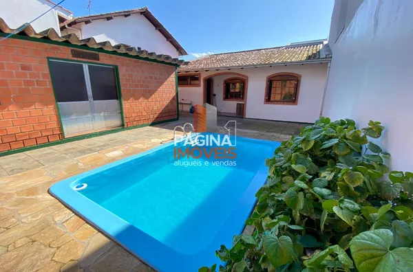 Página 1 Imóveis anuncia para Venda excelente casa térrea, com 03 dormitórios,  no bairro Nossa Senhora das Graças, em Canoas/RS.