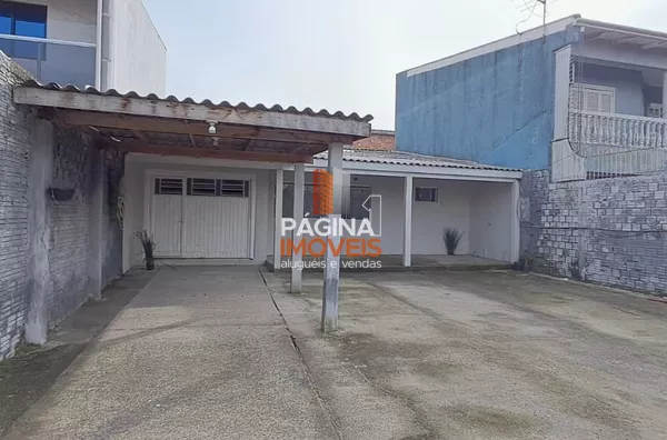 Página 1 Imóveis anuncia para venda e locação, ampla casa com 02 dormitórios no bairro Harmonia em Canoas–RS.