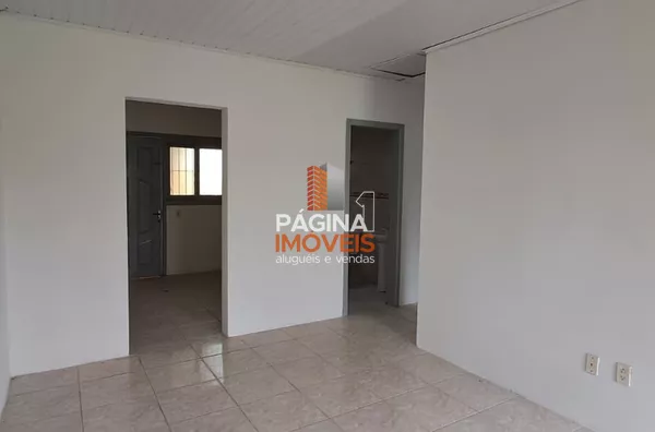 Página 1 Imóveis anuncia excelente casa térrea de 02 dormitórios para aluguel, no bairro Fátima, em Canoas/RS.
