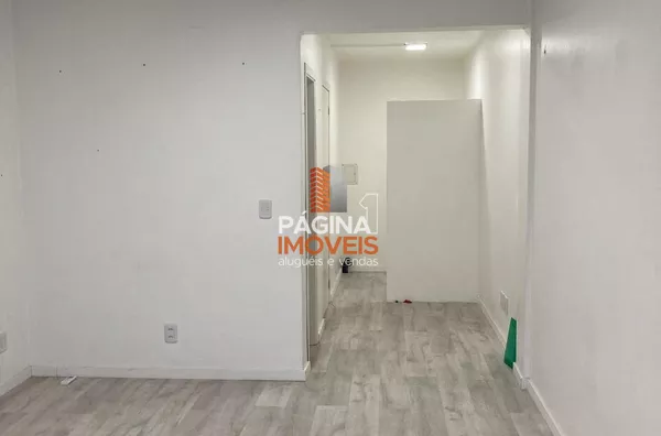 Página 1 Imóveis anuncia sala comercial com lavabo no condomínio "Empresarial Baronio", no bairro Centro em Canoas/RS.