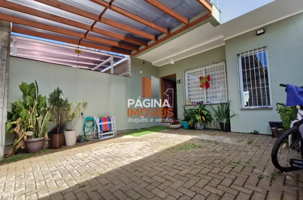Página 1 Imóveis anuncia para venda, uma excelente casa/sobrado com 03 dormitórios, sendo 01 suíte, no bairro Igara em Canoas/RS.
